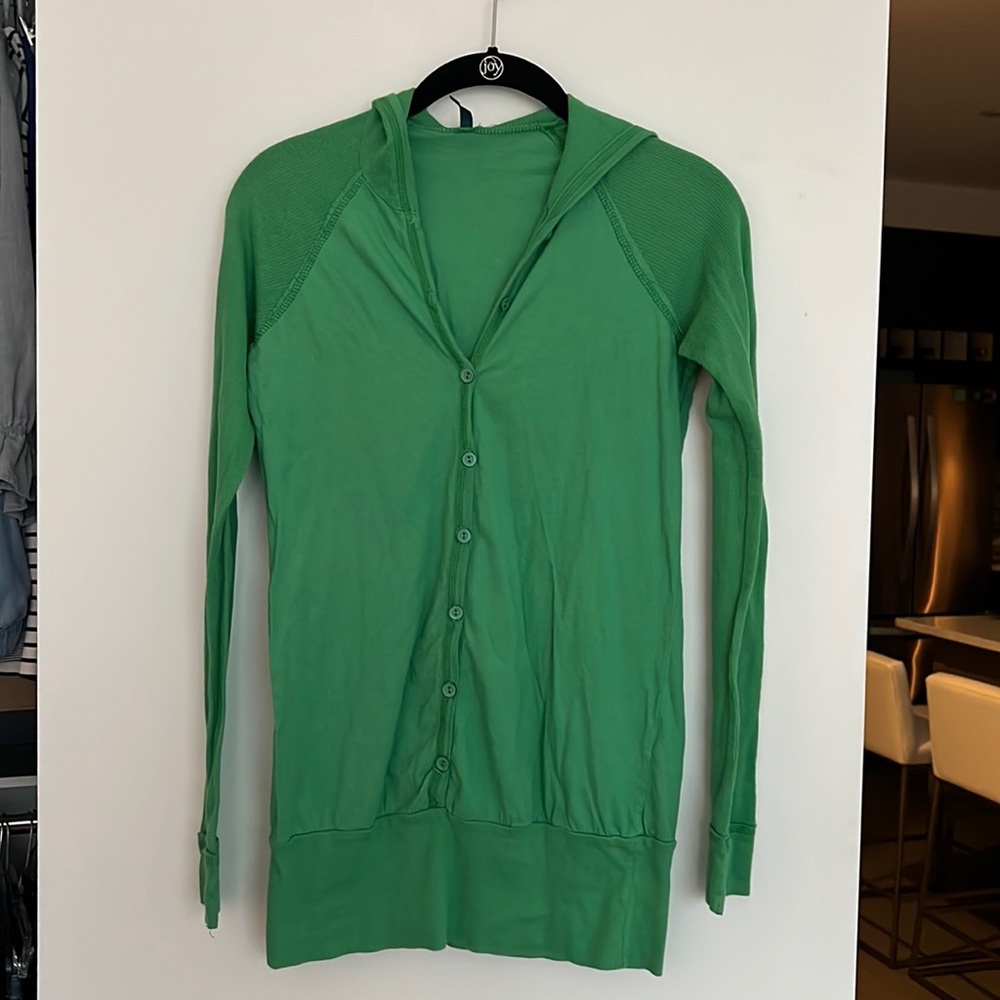 Francesca’s green hoodie